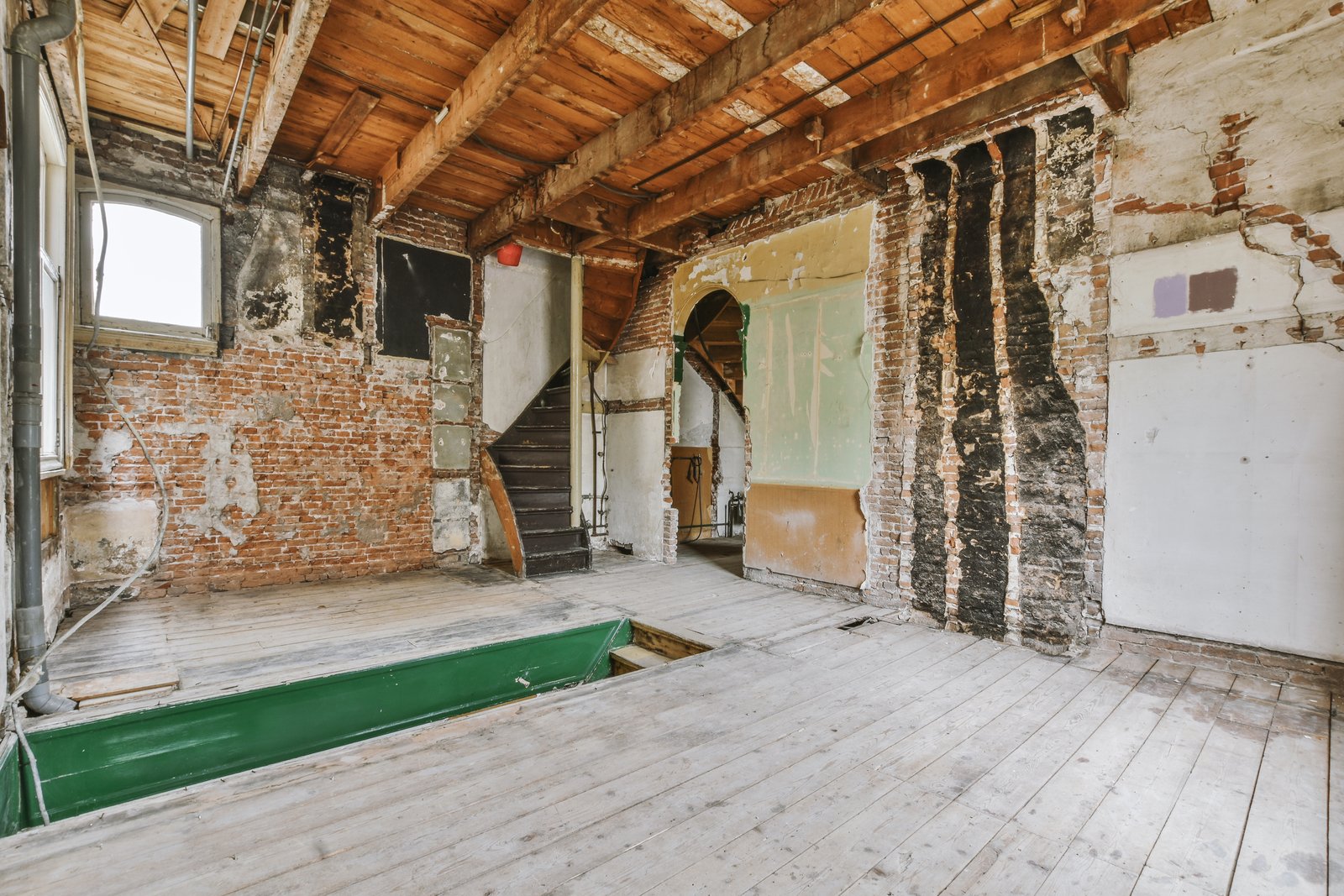 Distressed interior of a residence after fire damage, under restoration