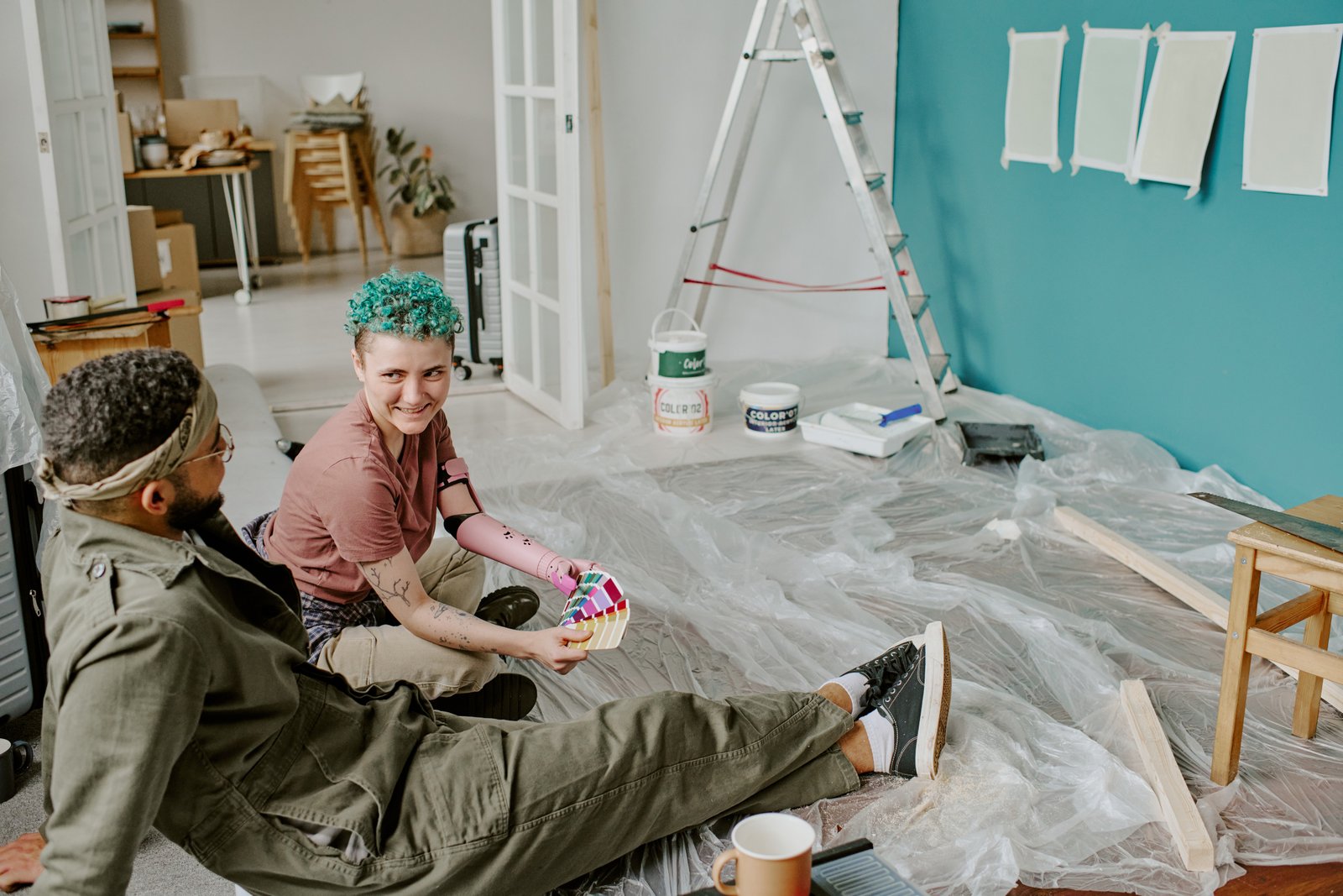 People restoring a historic home with period-appropriate colours